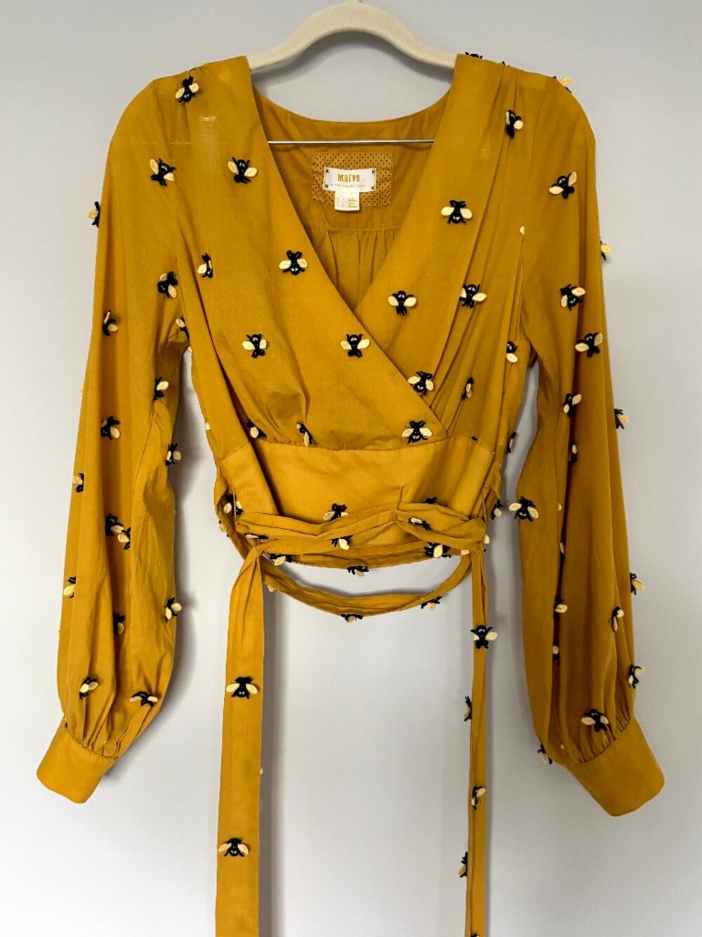 Maeve by Anthropologie: Bee-Embroidered Wrap Blouse